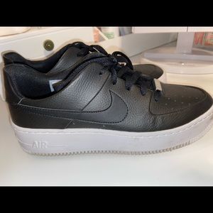 Women’s platform black Nike Air Force 1’s